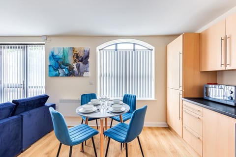 Dining area with seating for up to 4 guests.