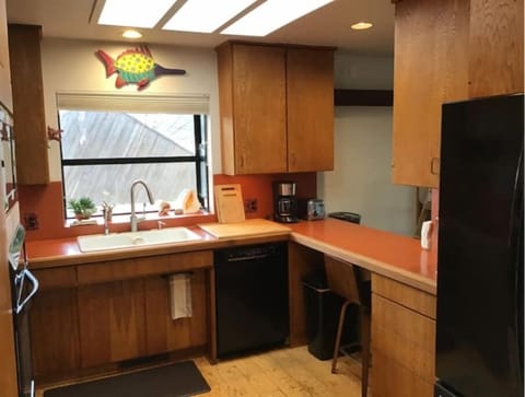 Fully stocked kitchen including spices/herbs/tea/coffee/cream/sugar etc.