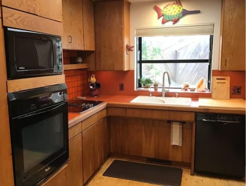 Fully stocked kitchen including all pots, pans, dishes and utensils.