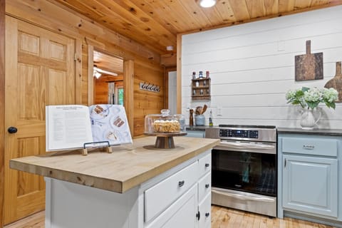 Rustic Cabin Kitchen | Stainless Steel Appliances, Butcher Block Island, and Cozy Farmhouse Décor