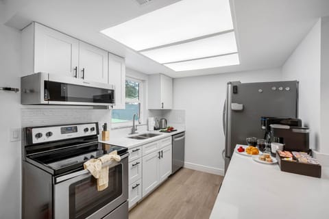 Whether you're meal prepping or making midnight snacks, this kitchen has everything you need—from cookware to coffee mugs.