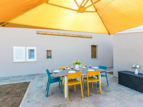 Furniture, Outdoor Furniture, Chair, Flooring, Floor, Table, Kitchen & Dining Room Table, Outdoor Table, Swimming Pool, Resort