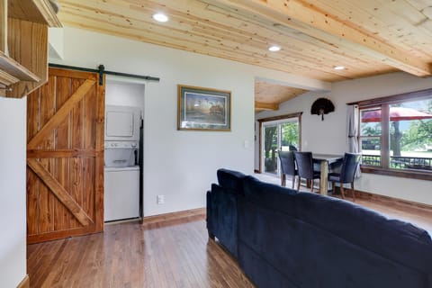 Laundry is conveniently found behind the sliding barn doors on the main level