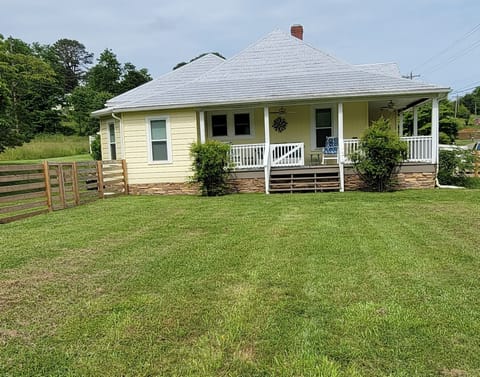 looking from the yard back at the covered side porch