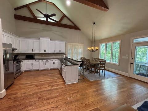 Fully Stocked Kitchen & Plenty of seating at the Dining Table