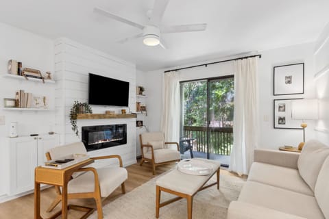 Comfortable Seating and Electric Fireplace Set the Tone for a Relaxing Vacation