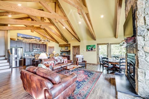 Rustic wooden truss vaulted ceiling in main living area 