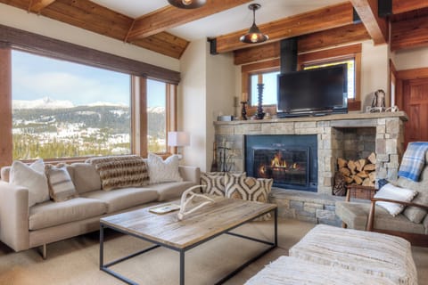 Living room with real wood fireplace