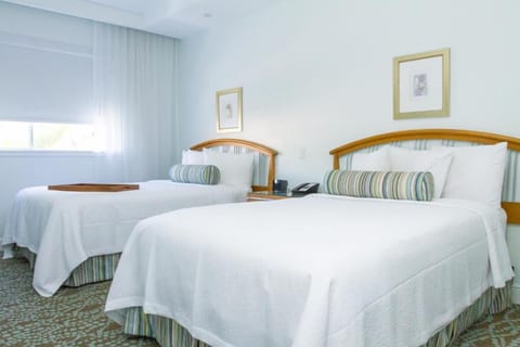 Unwind in crisp linens with two comfy beds.