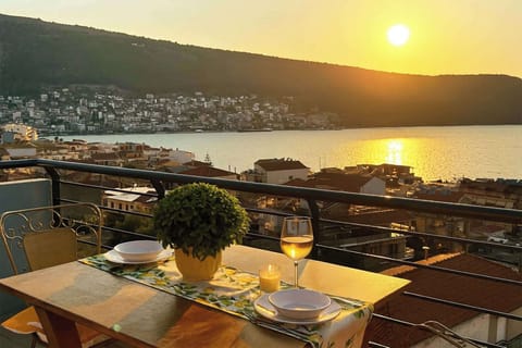 Enjoy breakfast or wine above the rooftops with panoramic sea vistas.