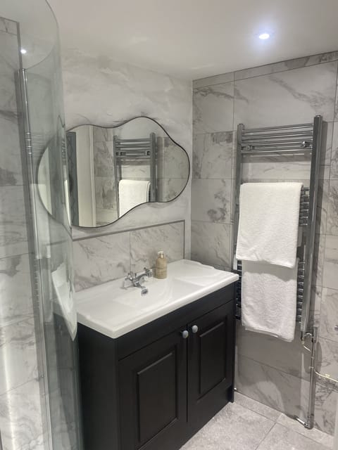 Large sink and heated towel rail