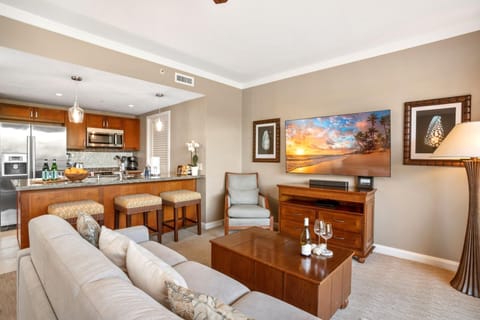 Enjoy open-plan comfort with full kitchen, modern amenities, HDTV & cozy seating—perfect Maui getaway vibes HKK-236