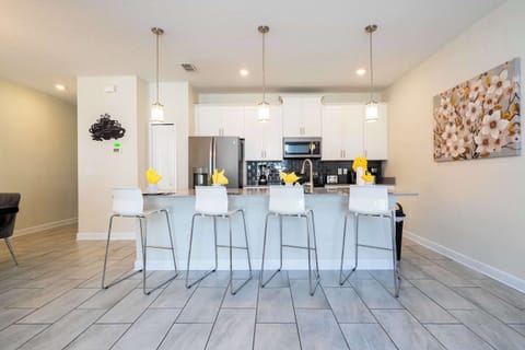 Enjoy open-concept living with a modern kitchen, bright dining area, and plenty of seating-perfect for gathering, cooking, and making memories together!