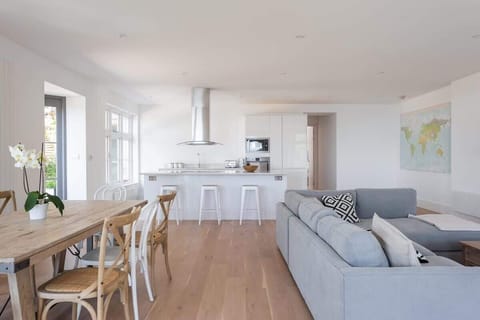 The modern kitchen comes fully equipped with everything you need for your stay.