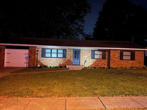 Solar lighting on front of home at night