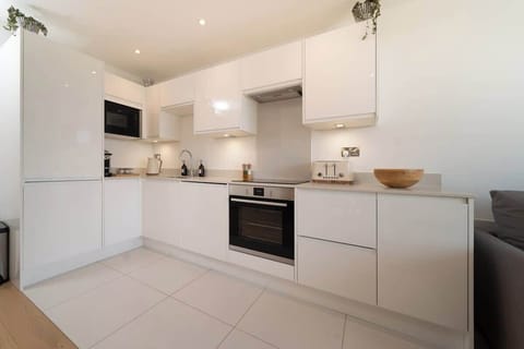 The modern kitchen comes fully equipped with everything you may need during your stay.