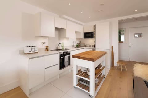 The kitchen comes fully equipped with everything you could need during your stay.