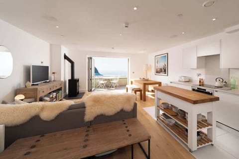 Relax in the open plan living space and take in the stunning sea views.