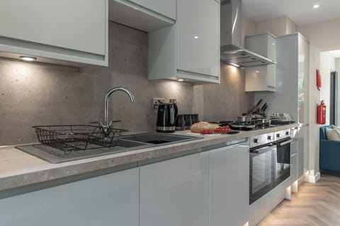 The kitchen sink to tidy up your plates and cooking utensils