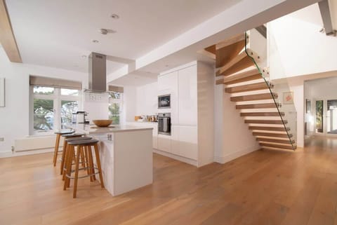 The spacious kitchen comes fully equipped with everything you need for your stay.