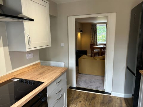 Kitchen looking into lounge