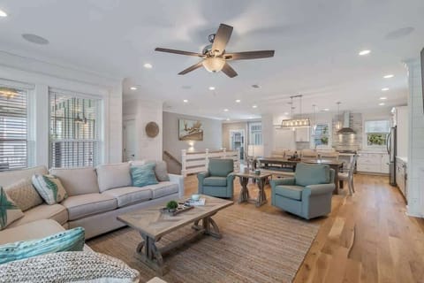 Welcome to the Salty Seahorse - Perfect for your family getaway. This property sleeps 14 people. This open concept living room, dining room, and kitchen is great for entertaining your family.