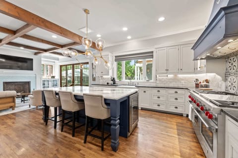 Chef’s kitchen with island seating for 3