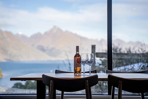 Sip wine with unforgettable lake and mountain views.