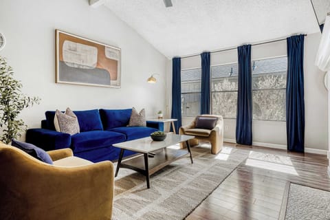 Open-concept living with bold accents, cozy textures, and space to gather or recharge