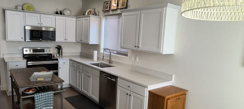 Appliances are in great condition. There is a spacious island and dinette area.