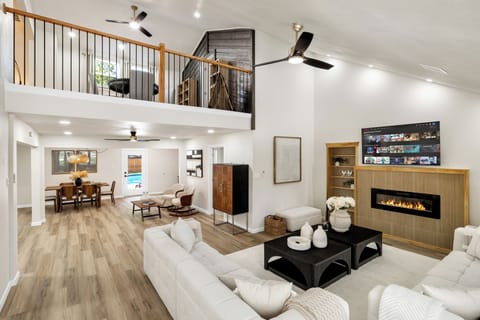 An entertainer's dream. From this vantage point, appreciate the vastness of the living space and its seamless connection, designed to host unforgettable experiences in an elegantly modern setting.