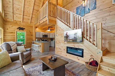 Comfortable Living Area with lots of Natural Light and Cathedral Ceilings 