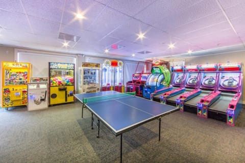 Challenge friends to ping-pong and classic arcade favorites indoors.
