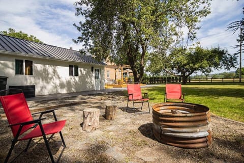 Fire Pit with amble wood supply and an entire backyard to enjoy the evenings away.