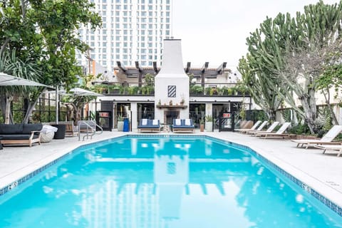 Stretch out poolside in a serene courtyard oasis.