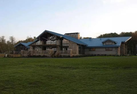 The Lodge features a community room, fitness center, library, and billiards room