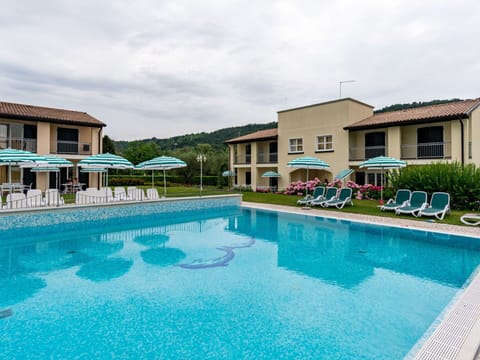Water, Sky, Plant, Cloud, Property, Swimming Pool, Building, Azure, Window, Chair