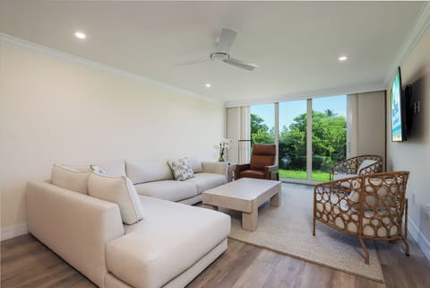 Living area with plush sectional and SmartTV