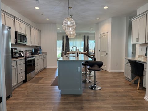 View for glass doors to dining area shows just how much space there is to entertain a large family or friends gathering.