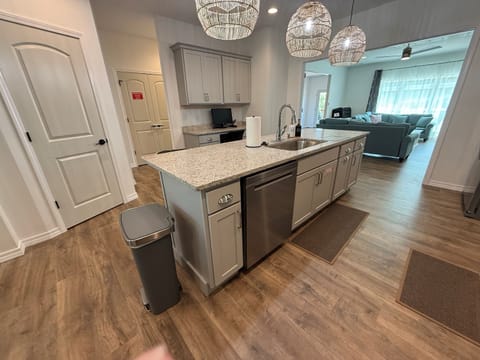 Sink and dishwasher in island make clean up easier