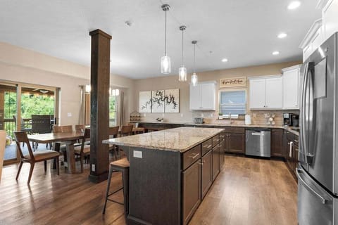 Open concept kitchen allows you to still be a part of the fun when duty calls.