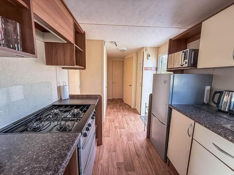 Bright, fully equipped kitchen with ample counter space