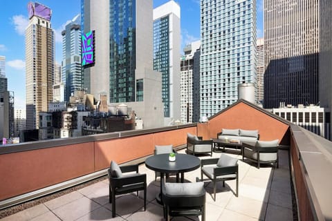 Sip cocktails on the rooftop with sweeping city views.