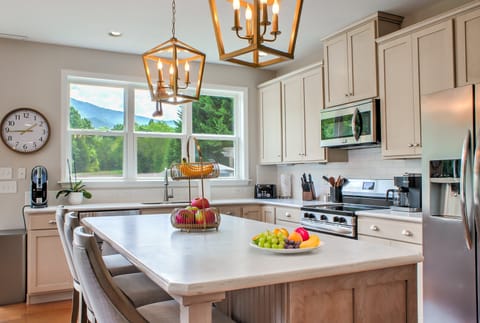 Kitchen is outfitted with an Electric Range