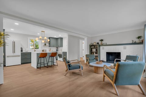 Flow from fireplace to feast with effortless style.