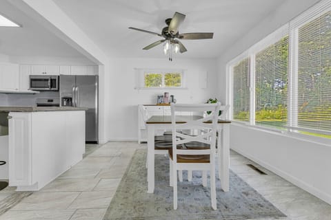 Dining room drenched in natural light — morning coffee never stood a chance