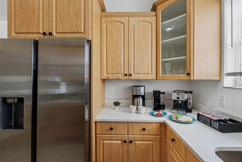 This open kitchen is thoughtfully designed with modern appliances and a layout that makes cooking and entertaining effortless.