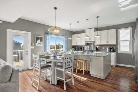 Chef’s kitchen with oversized island and top-tier appliances
