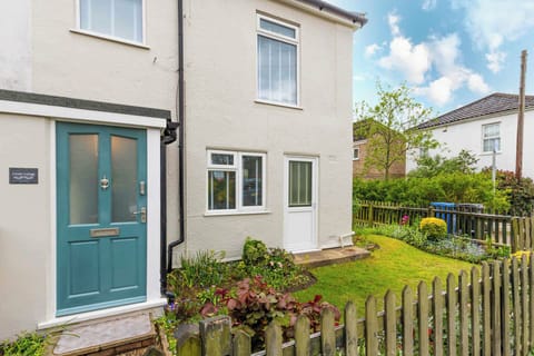 A street view of Corner Cottage featuring a garden. This property includes on-street parking during your stay.