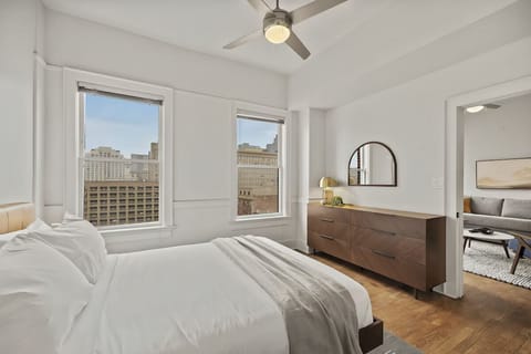 Stretch out on crisp linens in a calm, airy bedroom.